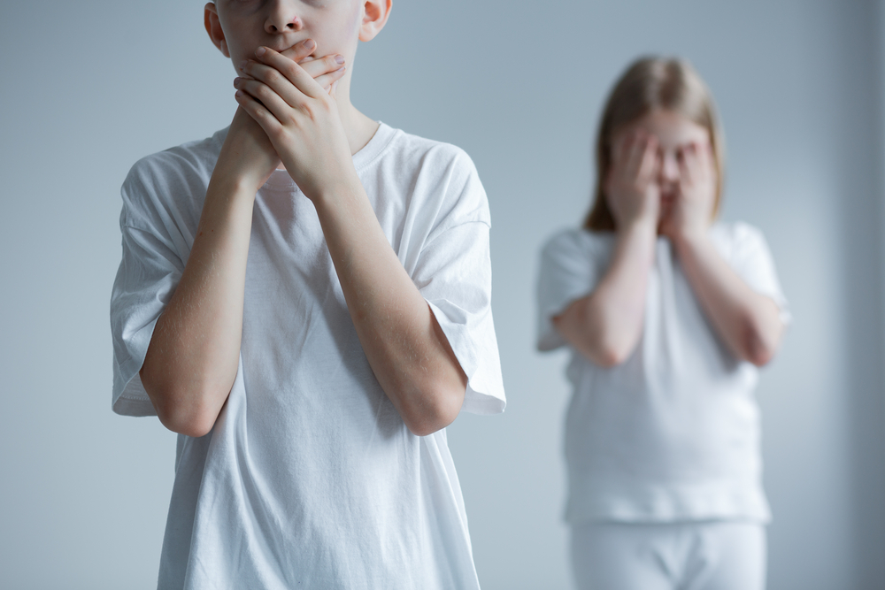 Boy and Girl embarrassed about bedwetting